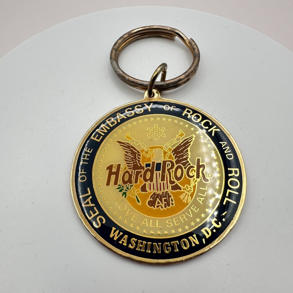 Vintage 90s Hard Rock Cafe Washington D.C. Seal of Embassy Keychain Gold Tone